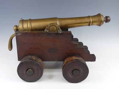 Lot 1245 - An antique ornamental brass yacht starting...