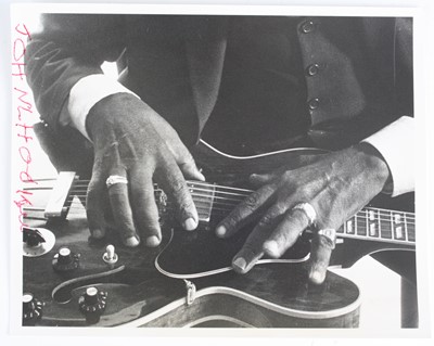 Lot 691 - John Lee Hooker, a 20 x 25.5cm black and white...