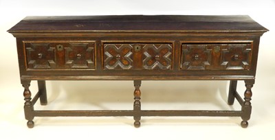 Lot 1454 - A Jacobean period oak dresser base, having a...