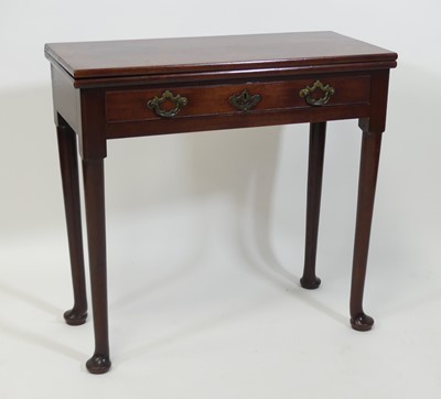 Lot 1384 - A George III mahogany tea table, having a fold-...