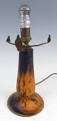 Lot 62 - A Muller Frères glass lamp base, raised on...