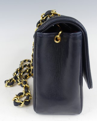 Lot 134 - Coco Chanel - a navy leather 'Madamoiselle'...
