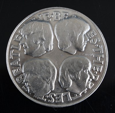 Lot 692 - The Beatles, a 1966 silver medal, obv:...