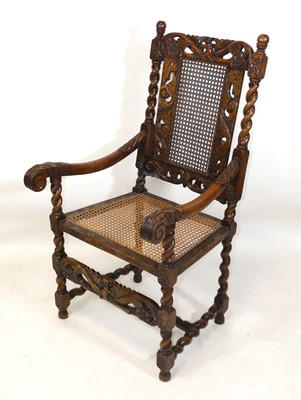 Lot 1453 - A Victorian carved walnut elbow chair in the...
