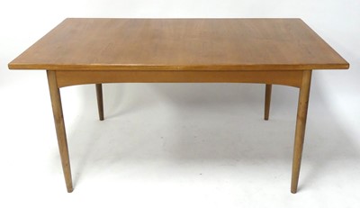 Lot 348 - A 1960s G-Plan 'Fresco' teak dining table, the...