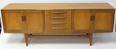 Lot 349 - A 1960s G-Plan 'Fresco' teak long sideboard,...
