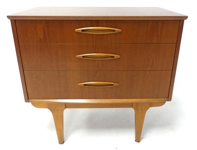 Lot 360 - A 1960s Jentique teak compact three-drawer...