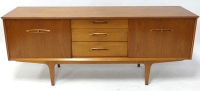 Lot 361 - A 1960s Jentique teak long sideboard, having...