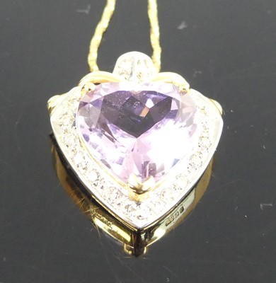 Lot 1177 - An 18ct yellow and white gold, amethyst and...