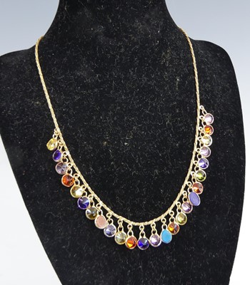 Lot 1170 - A yellow metal multi paste set necklet,...