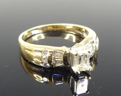 Lot 1181 - A 14ct yellow and white gold diamond solitaire...