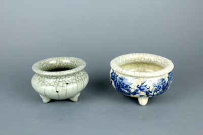 Lot 2114 - A Chinese guan type tripod censer and another...