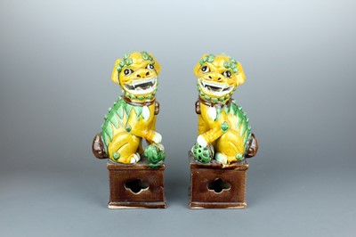 Lot 2154 - A pair of Chinese biscuit famille verte...
