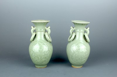 Lot 2104 - A pair of Chinese Longquan celadon-glazed...