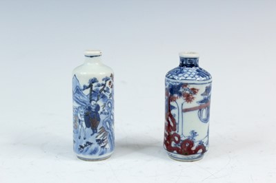Lot 2004 - Two Chinese underglaze blue and red snuff...