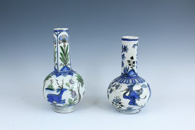 Lot 2221 - Two Persian pottery bottle vases, probably...