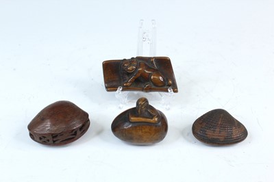 Lot 2232 - A Japanese wood netsuke in the form of a...