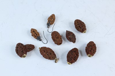 Lot 2052 - Nine Chinese olive pit carvings, Qing dynasty,...