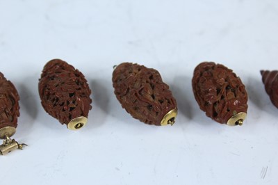 Lot 2052 - Nine Chinese olive pit carvings, Qing dynasty,...