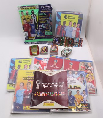 Lot 2056 - A tray of Panini football cards, loose and...