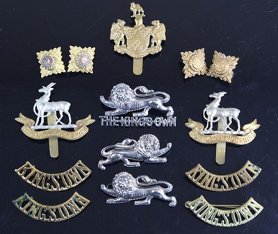 Lot 3280 - A collection of cap badges to include The King'...