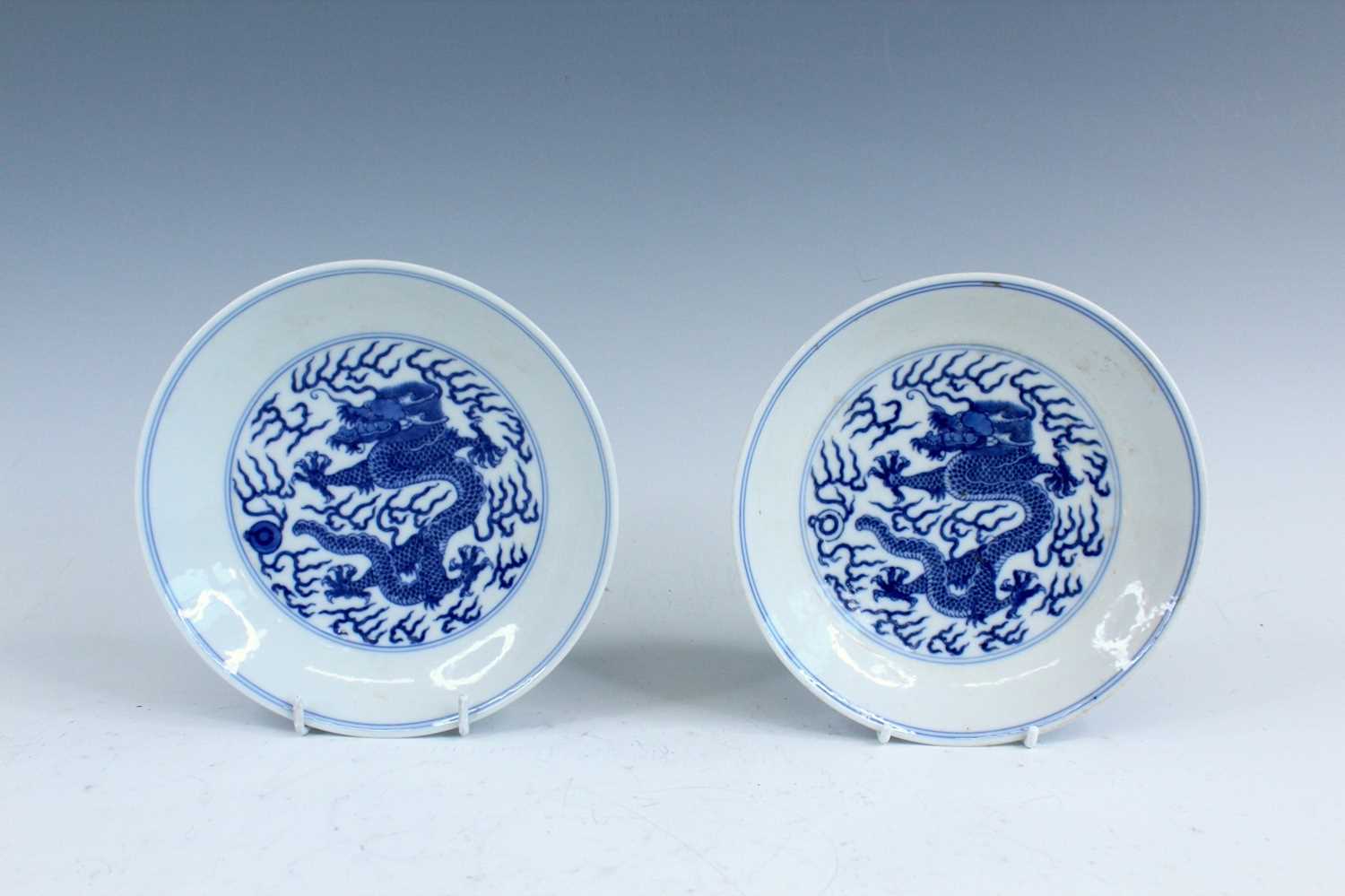 Lot 2033 - A pair of Chinese blue and white “dragon”...