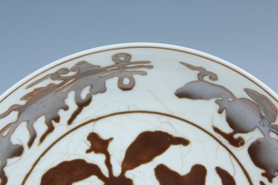 Lot 2155 - A Chinese iron-brown-decorated 'gardenia' dish,...