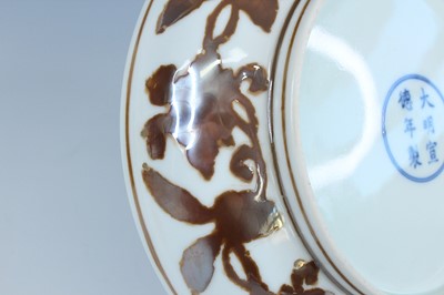 Lot 2155 - A Chinese iron-brown-decorated 'gardenia' dish,...
