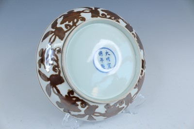 Lot 2155 - A Chinese iron-brown-decorated 'gardenia' dish,...