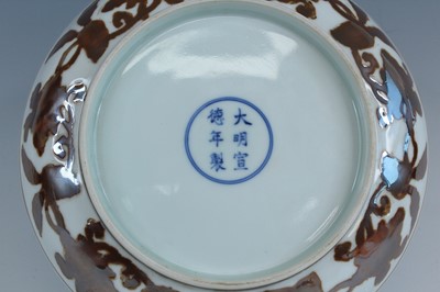Lot 2155 - A Chinese iron-brown-decorated 'gardenia' dish,...