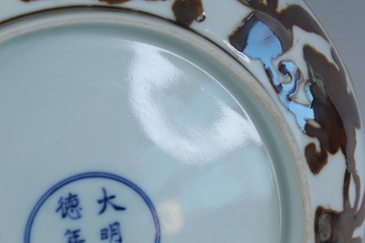 Lot 2155 - A Chinese iron-brown-decorated 'gardenia' dish,...
