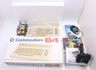 Lot 1455 - A Commodore 64C Sports Pack, comprising of...