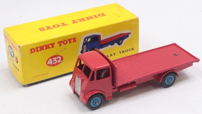 Lot 1031 - A Dinky Toys No. 432 Guy flat truck comprising...