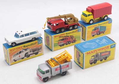 Lot 1499 - A collection of four various boxed Matchbox...