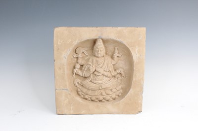 Lot 2099 - A Chinese Song-style Buddha tile, carved in...