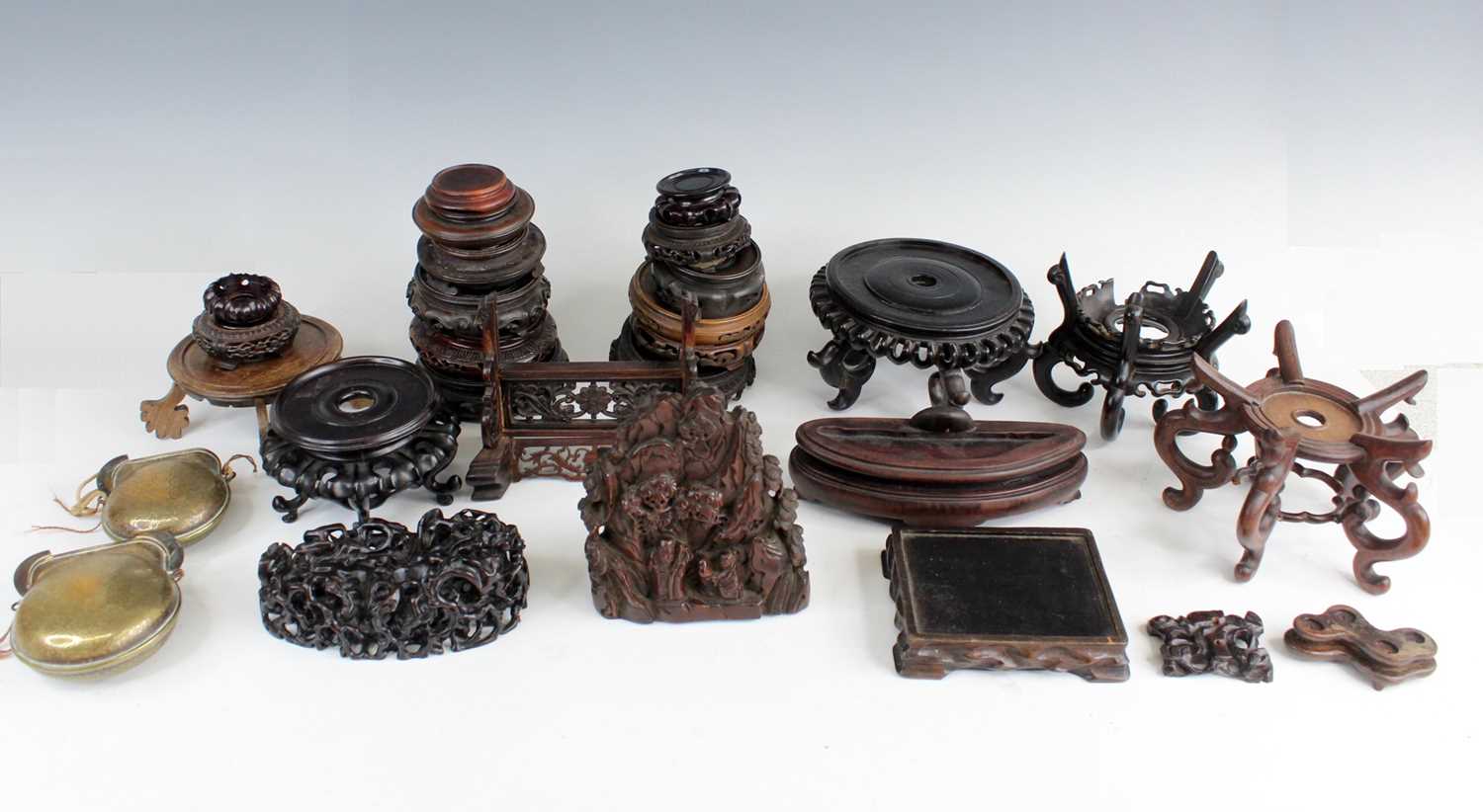 Lot 2095 - A collection of Chinese wooden stands and...