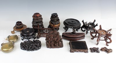 Lot 2095 - A collection of Chinese wooden stands and...