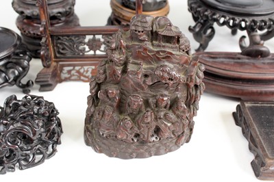 Lot 2095 - A collection of Chinese wooden stands and...