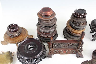 Lot 2095 - A collection of Chinese wooden stands and...