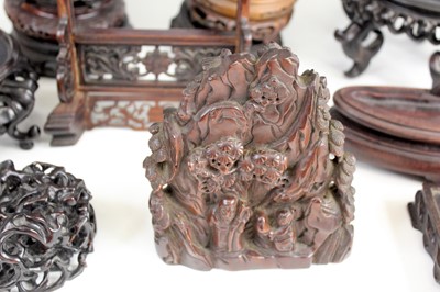 Lot 2095 - A collection of Chinese wooden stands and...