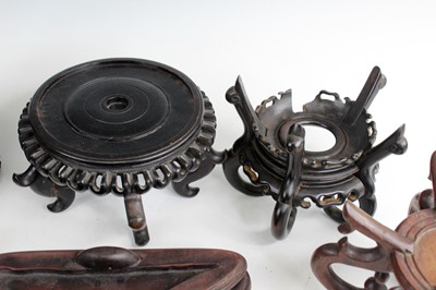 Lot 2095 - A collection of Chinese wooden stands and...
