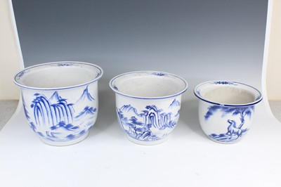 Lot 2193 - Three Chinese blue and white planters, 20th...