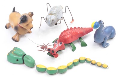 Lot 2015 - Five mainly Triang clockwork toys to include a...