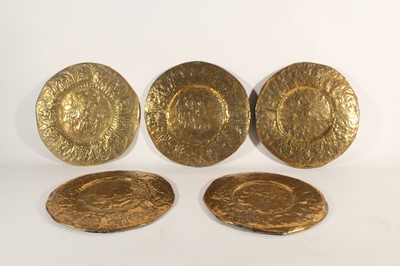 Lot 2213 - A set of five brass Indian temple plates, 19th...