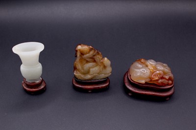 Lot 2048 - A group of six Chinese jade carvings, Qing...