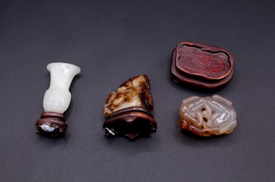 Lot 2048 - A group of six Chinese jade carvings, Qing...