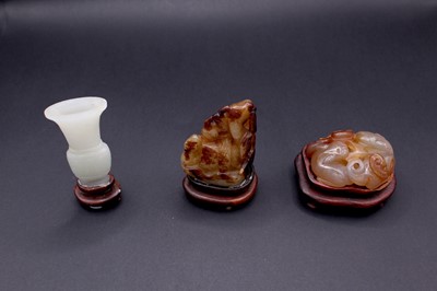 Lot 2048 - A group of six Chinese jade carvings, Qing...