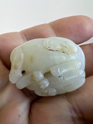 Lot 2048 - A group of six Chinese jade carvings, Qing...