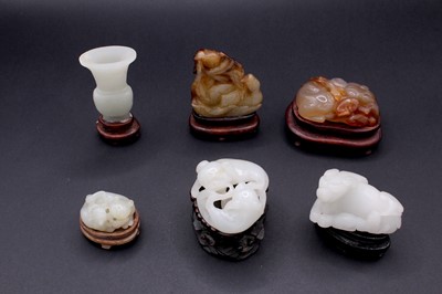 Lot 2048 - A group of six Chinese jade carvings, Qing...