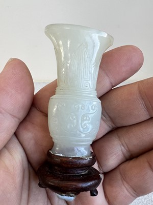 Lot 2048 - A group of six Chinese jade carvings, Qing...